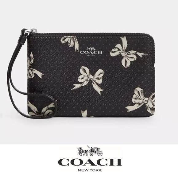 Coach Handbags - Coach Zip wristlet with bow print